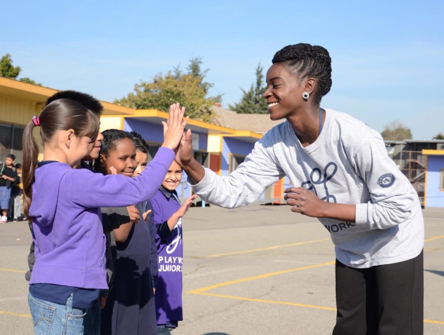 Why a high five is the most important thing you can do with your day